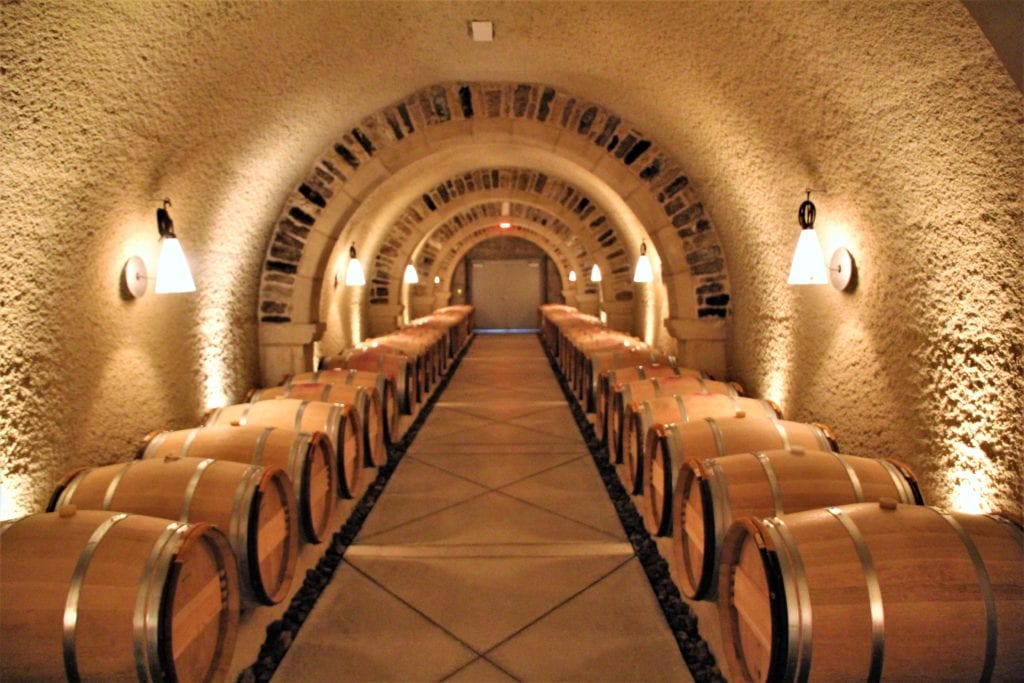 The tour continues as you walk through the barrels and caves.