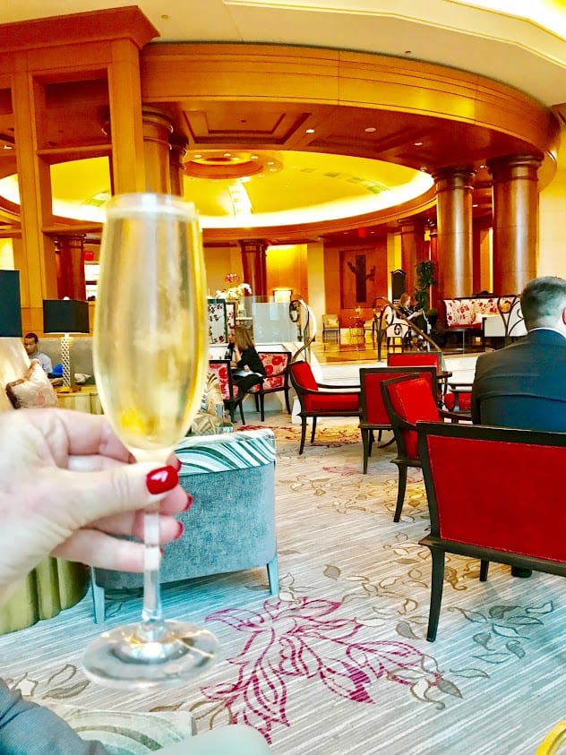 Enjoying a complimentary Champagne