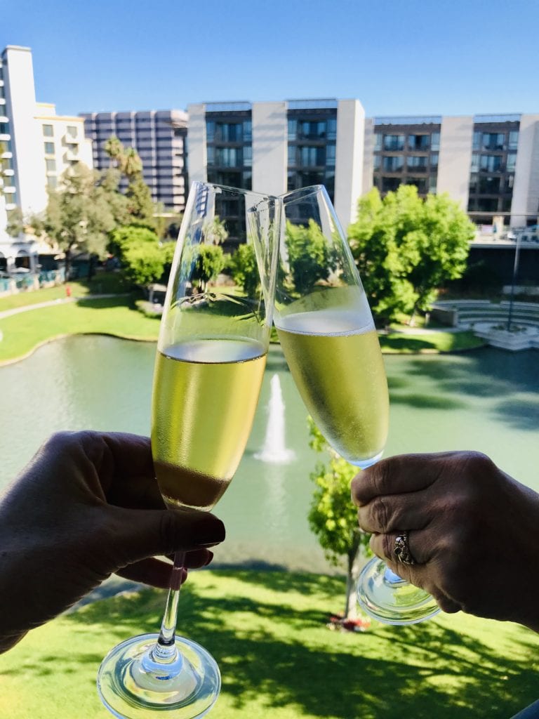 Enjoying some champagne on the balcony!  Cheers!