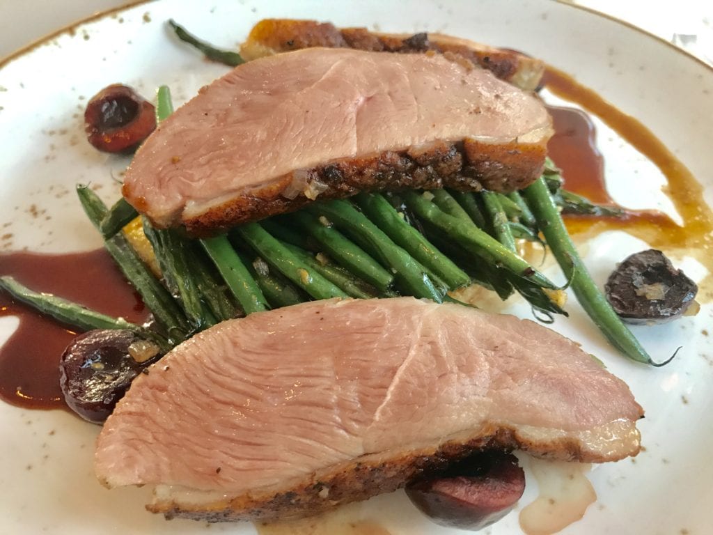 DUCK BREAST Bing cherry, thyme polenta cake, haricot vert, rosemary port sauce 