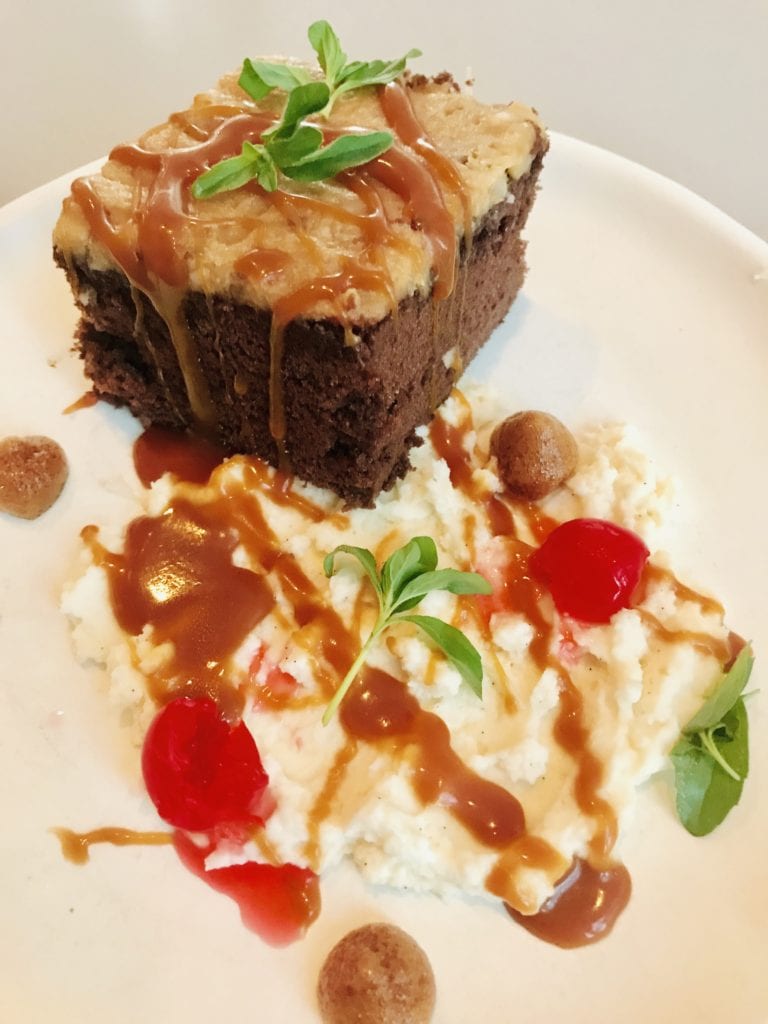 GERMAN CHOCOLATE CAKE Brandied cherries, coconut Chantilly, salted caramel sauce, espresso foam, mint