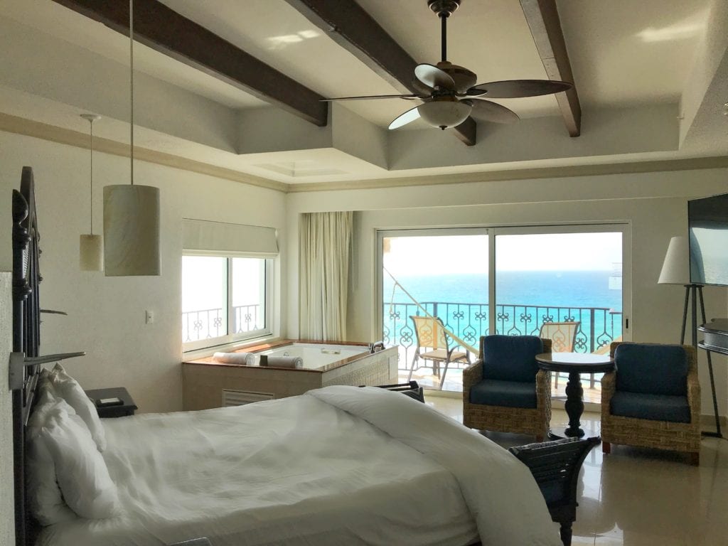 View of bedroom as you walk into your hotel room at Hyatt Zilara Cancun