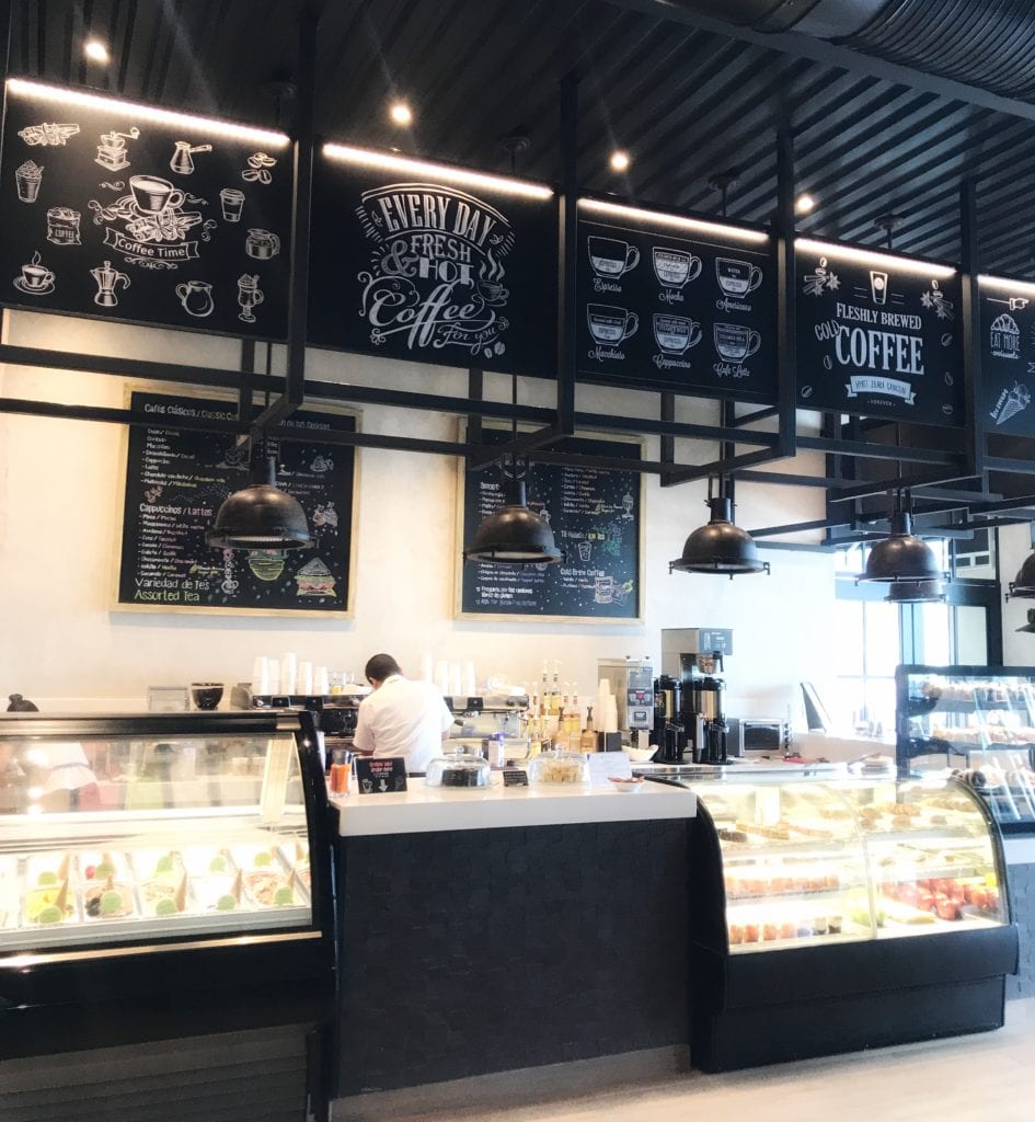 Casa Del Cafe counter with all baked goods and coffe.